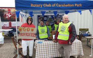 Firefighters and Rotary members having fun